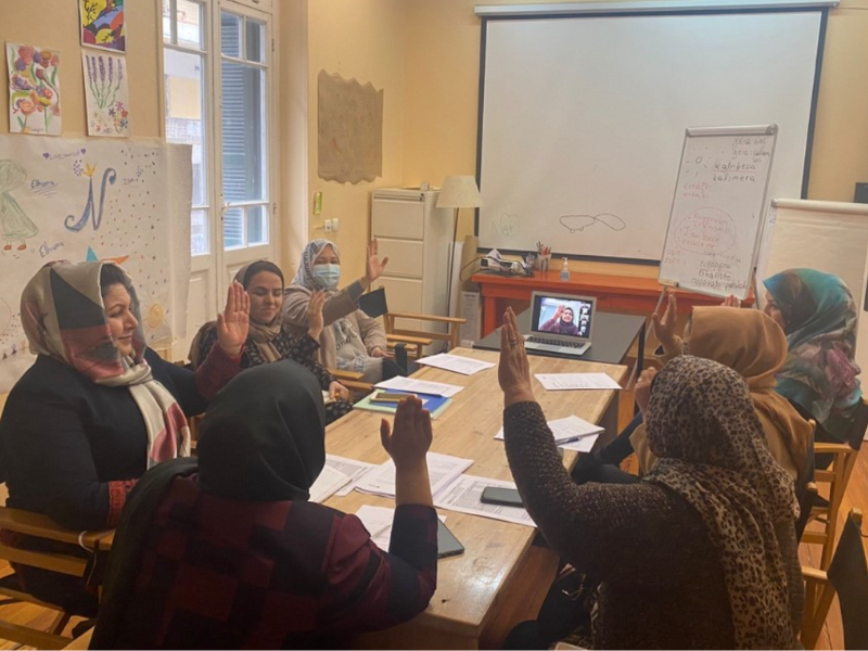 Members of the Afghan Women Parliamentarians and Leaders Network (AWPLN) voting for the board directorate at the Melissa Network office in Greece, April 2022