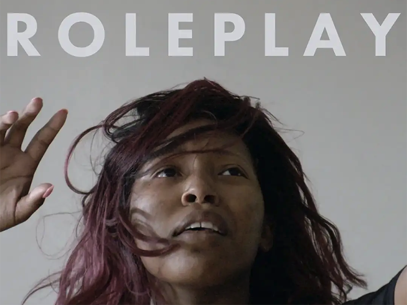 a black woman looks disgruntled under the word "replay"