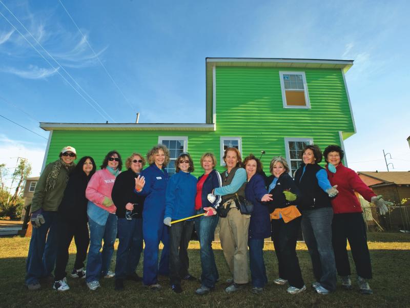 Photo of the Dirty Dozen posting outside of a New Orleans home