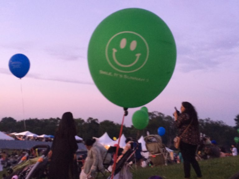 The balloon says “smile, its sunnah.” Sunnah refers to the sayings and actions of the Islamic prophet Muhammad (peace be upon him).
