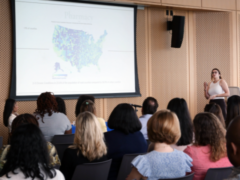 Newcomb Scholar presents research to faculty and peers
