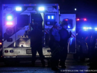 New Orleans ambulance surrounded by police officers