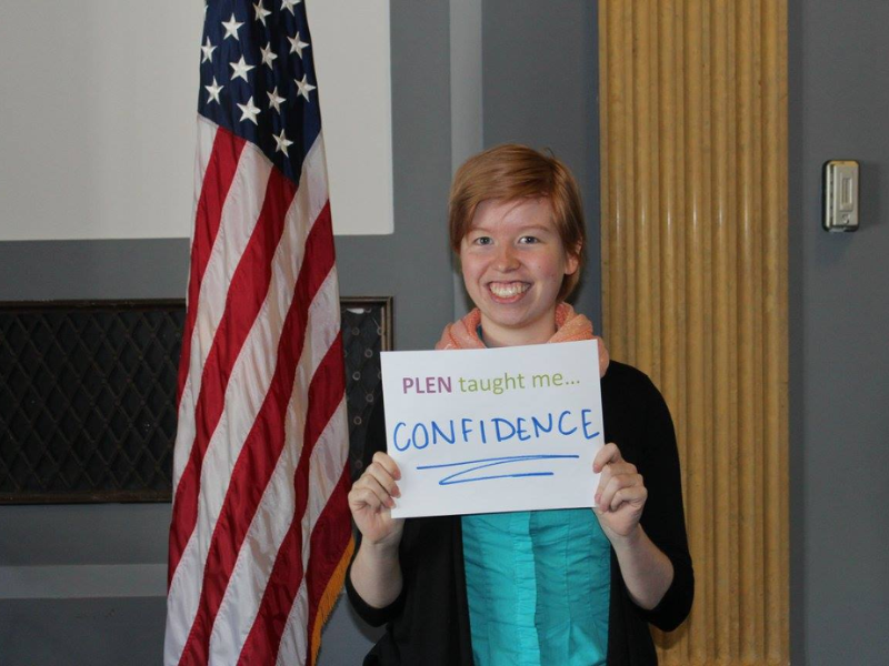 Christy Smith holding PLEN sign