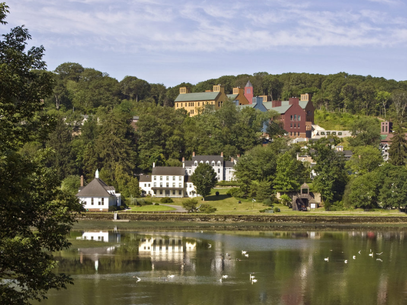 river and trees with houses