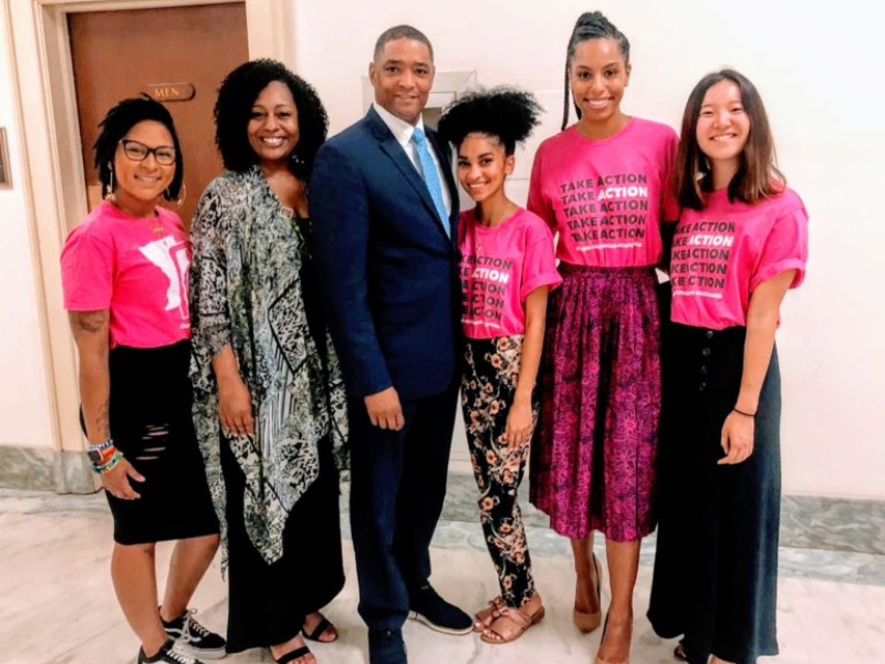 students with Louisiana Representative Cedric Richmond