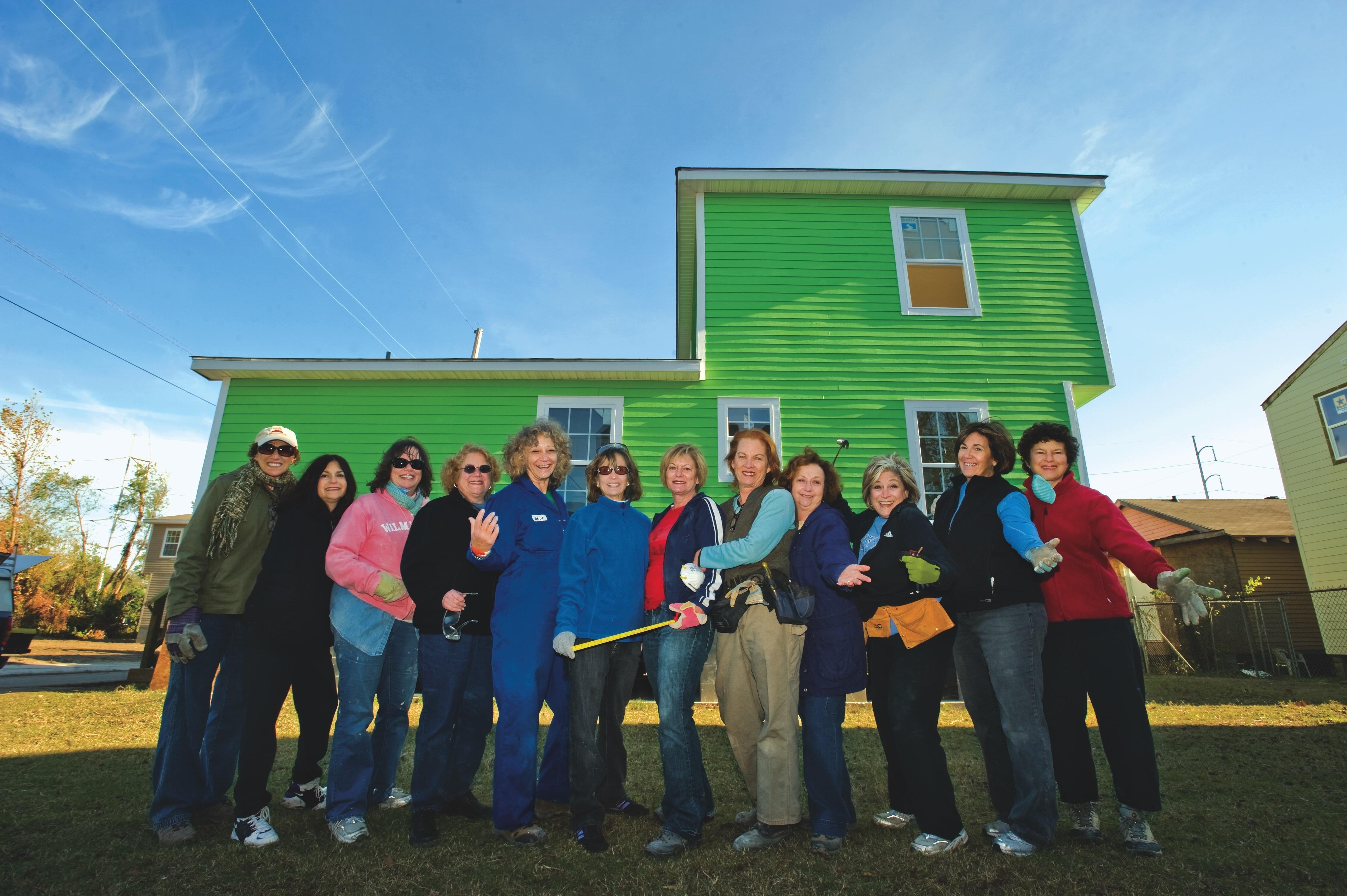 Photo of the Dirty Dozen posting outside of a New Orleans home